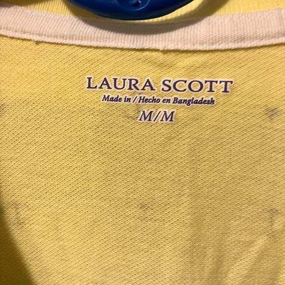 Slightly wore , yellow , polo style, size medium - Picture 2 of 2